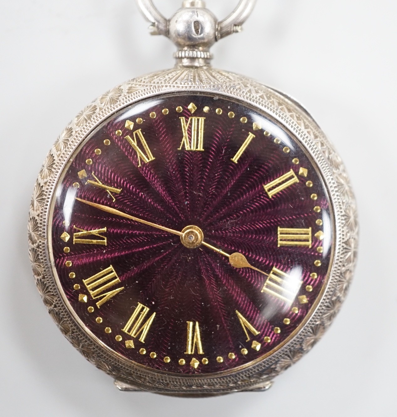 A Swiss 935 white metal fob watch with purple guilloche enamelled Roman dial.